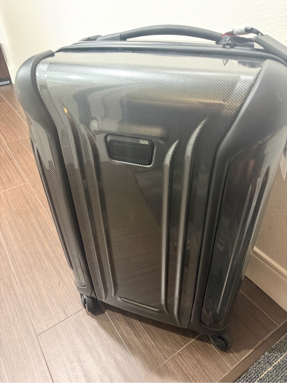 Tumi Black Textured Hardshell Carry-On with Tag